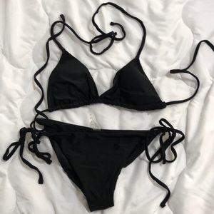 Black bikini, lightly padded top, no underwire, great condition!
